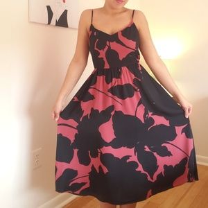 Woman spaghetti strap below the knee dress